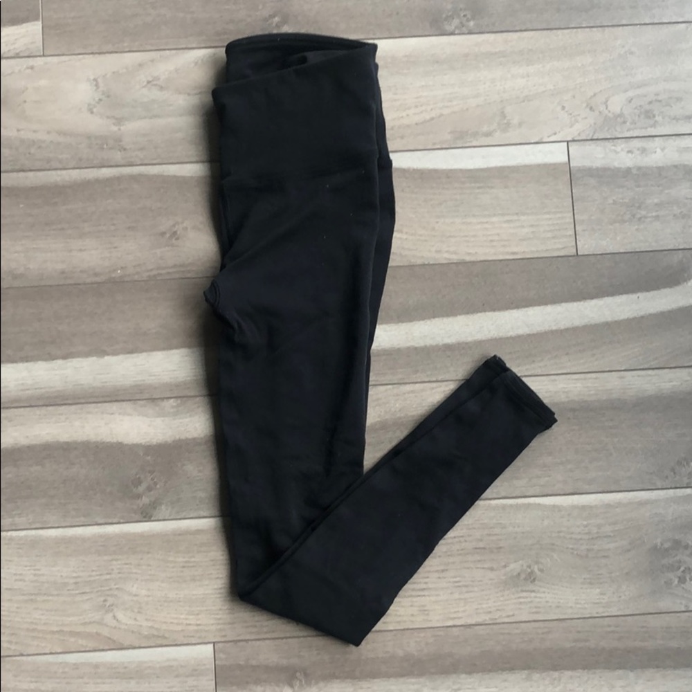 Lululemon black laser cut knit leggings, size 8